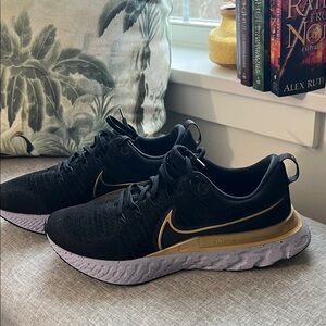 NIKE React Infinity Flyknit Black and Gold Running Shoes